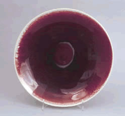 Friedl Kjellberg (designer), Arabia, Finland (manufacturer), red plate, porcelain, glazed, Diam:10-1/4", Gift of William Pitney, 2002.2