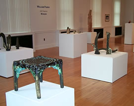 View of exhibition Wonder, sculpture by William Parry, left Off-Butterly #26, 1986, ceramic with oxides, h: 18" w: 35-1/2" d: 20", gift of the artist, S-JIMCA 1991.31; right The Last Complaint of the Armored Man, 1966, unglazed ceramic, h: 53" w: 13" d: 10", gift of Elizabeth Parry, S-JIMCA