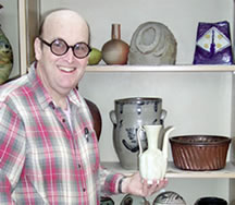 John Gill with a Chinese ewer from his own collection